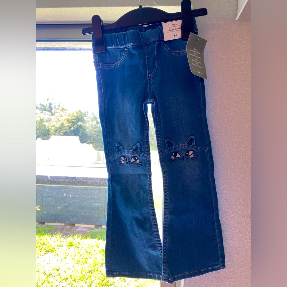 Blue Jean with cats on the knees